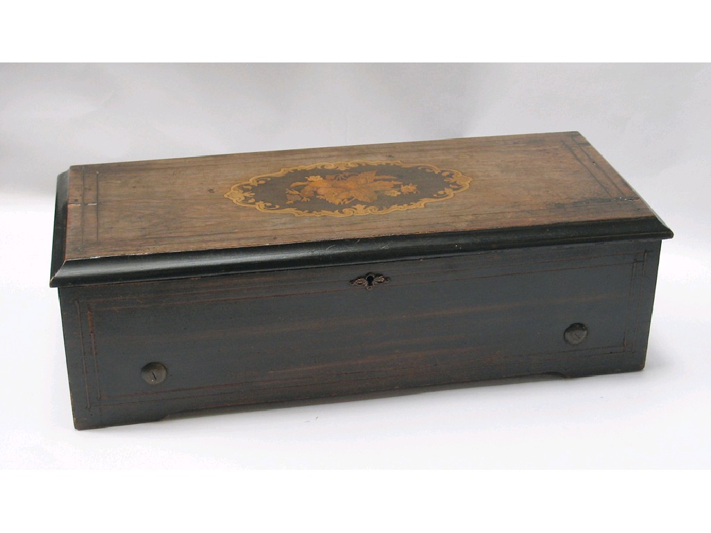 Appraisal: A VICTORIAN WALNUT CASED MUSICAL BOX the rectangular box with