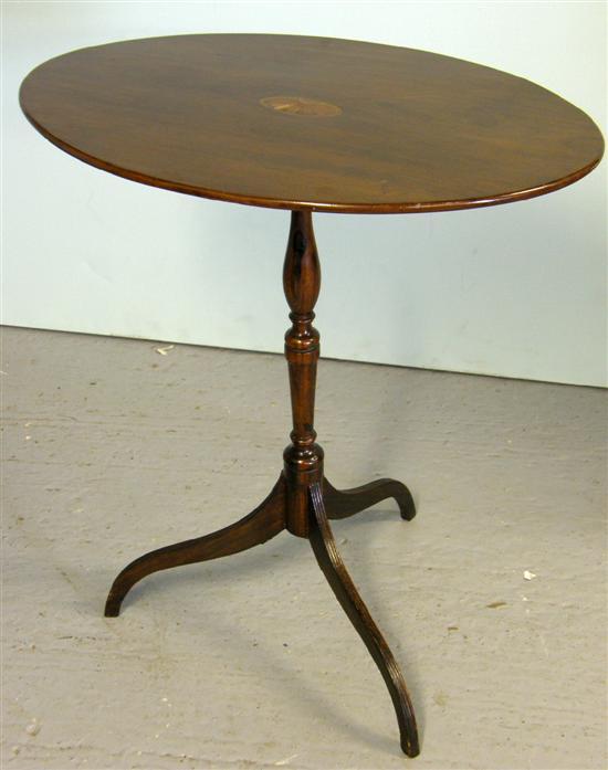 Appraisal: th century mahogany oval table inlaid with a shell on