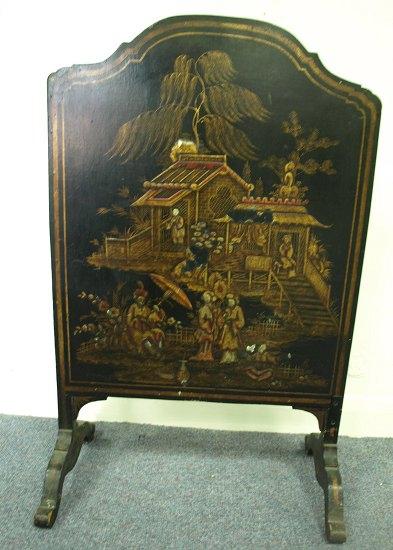 Appraisal: A chinoiserie firescreen on splay feet and a rush seat