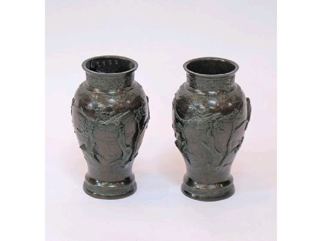 Appraisal: A PAIR OF JAPANESE BRONZE VASES cast and chased with