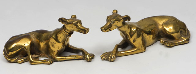 Appraisal: TH CENTURY GILT BRASS SCULPTURES of resting greyhounds one with