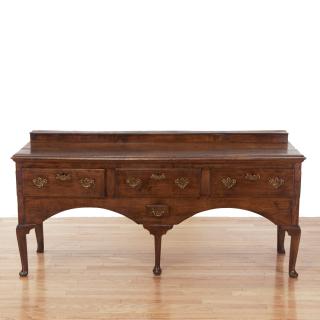 Appraisal: George II oak low sideboard George II oak low sideboard