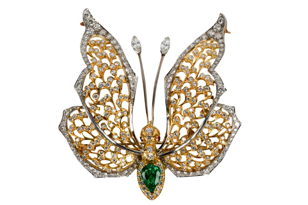 Appraisal: KARAT GOLD DIAMOND EMERALD RUBY BUTTERFLY BROOCHcontaining one pear shape