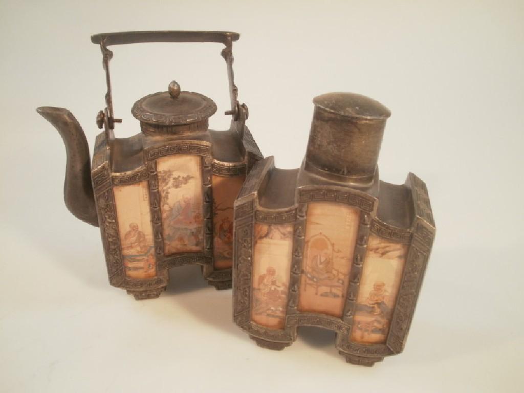 Appraisal: A cast metal Chinese teapot with inset printed panels a