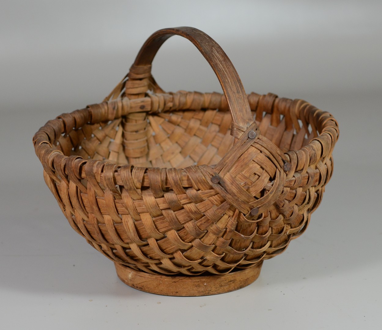 Appraisal: Round Basket with Wooden Bottom Support l x w x