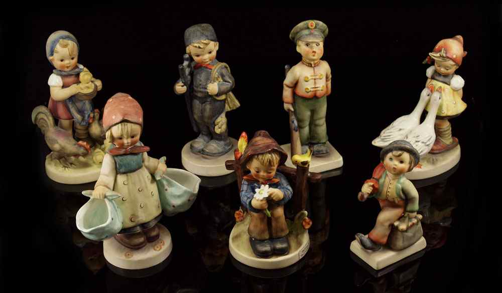 Appraisal: COLLECTION OF HUMMEL FIGURINES To include SHE LOVES ME SHE