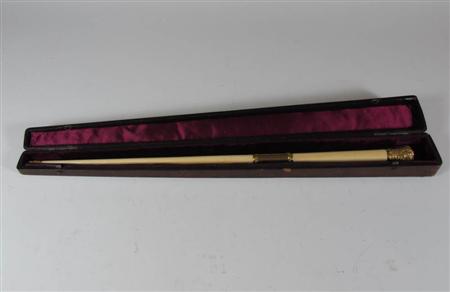 Appraisal: A late th century ivory and gilt metal conductor's baton