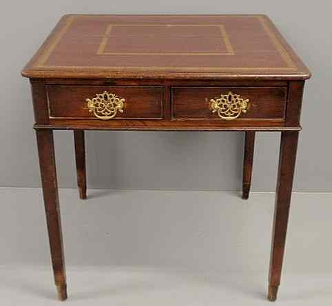 Appraisal: Georgian mahogany game table c with a tooled leather top