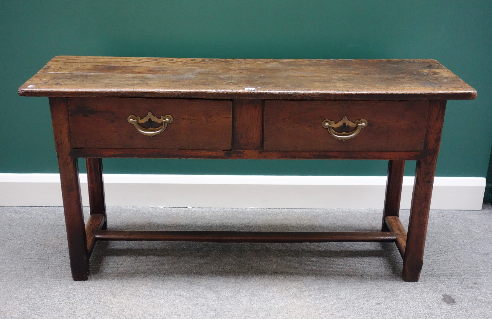 Appraisal: An th century and later small oak two drawer dresser