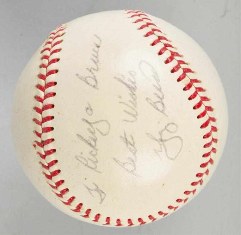 Appraisal: Autographed Yogi Berra Spalding Baseball Description s Warren Giles Official