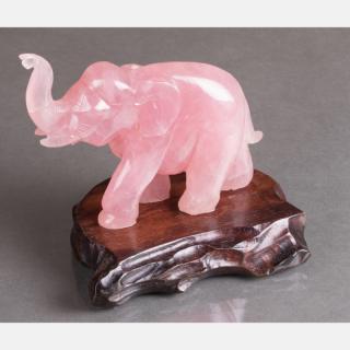 Appraisal: A Chinese Carved Rose Quartz Elephant Figure on a Carved