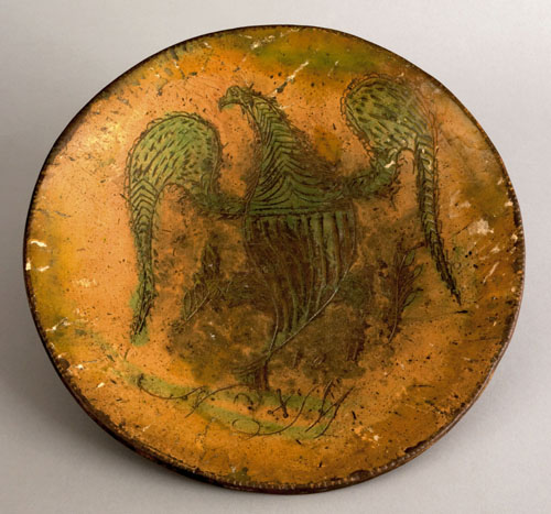 Appraisal: Southeastern Pennsylvania sgraffito decorated redware plate dated initialed NM with