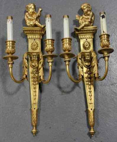 Appraisal: Pair of Gilt Bronze Caldwell Arm Sconces With musical instrument