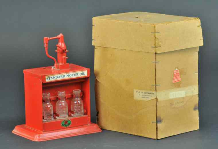 Appraisal: DOLL STANDARD MOTOR OIL STAND W BOX Germany red tin