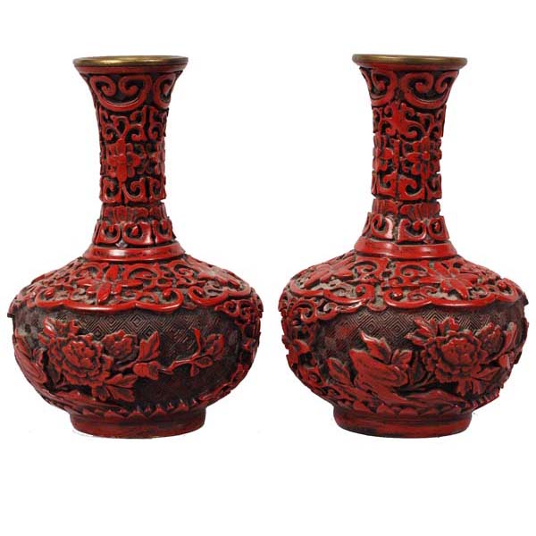 Appraisal: Pair of Chinese cinnabar vases with floral motifs x x