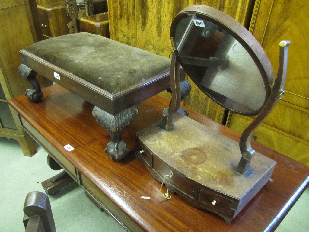 Appraisal: Mahogany dressing stool raised on ball and claw supports an