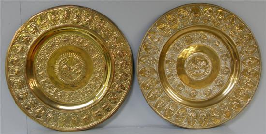 Appraisal: Indian circular brass plaque with embossed animal and figure decoration