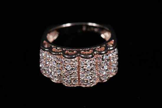 Appraisal: K ROSE GOLD AND DIAMOND RING Scalloped domed rose gold