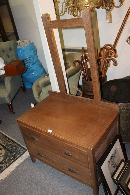 Appraisal: A HEALS OAK DRESSING CHEST from the Russet Series fitted