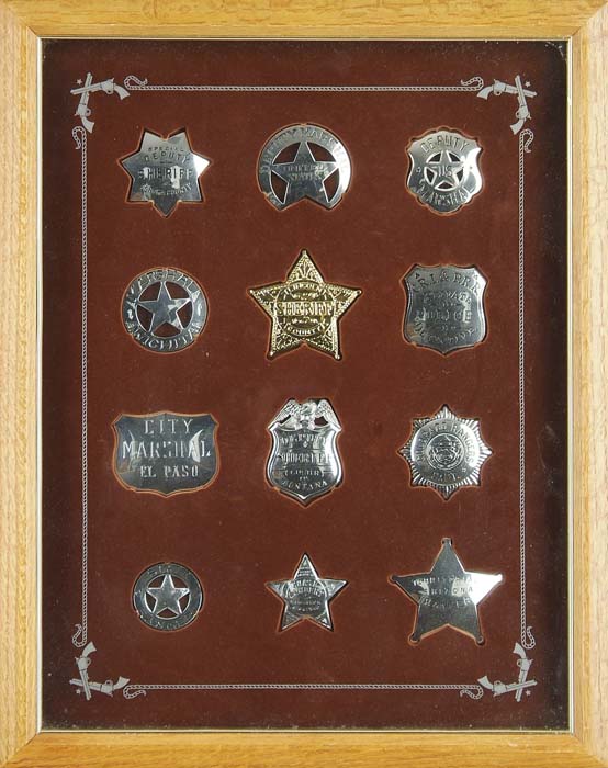 Appraisal: TWO FRAMED DISPLAYS OF LAW ENFORCEMENT BADGES There is contemporary