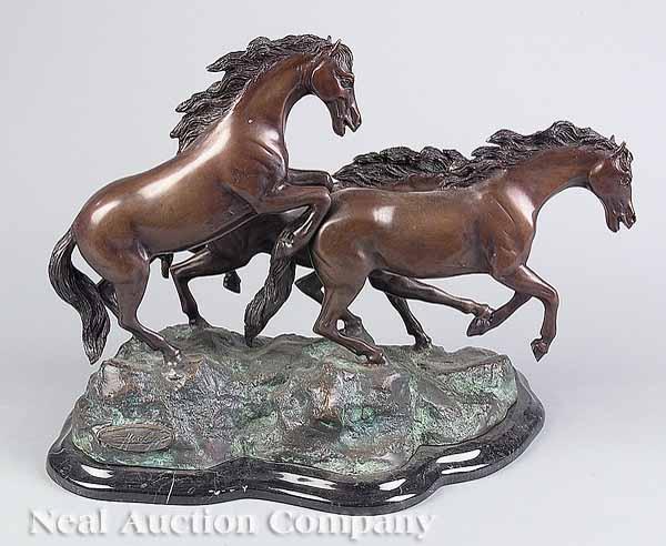 Appraisal: A Patinated Bronze Figural Group of Three Horses the galloping