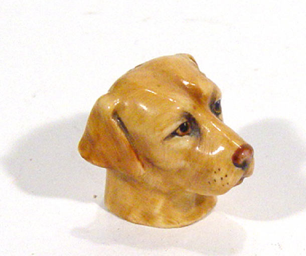 Appraisal: Hand painted bone china Staffordshire labrador thimble cm high