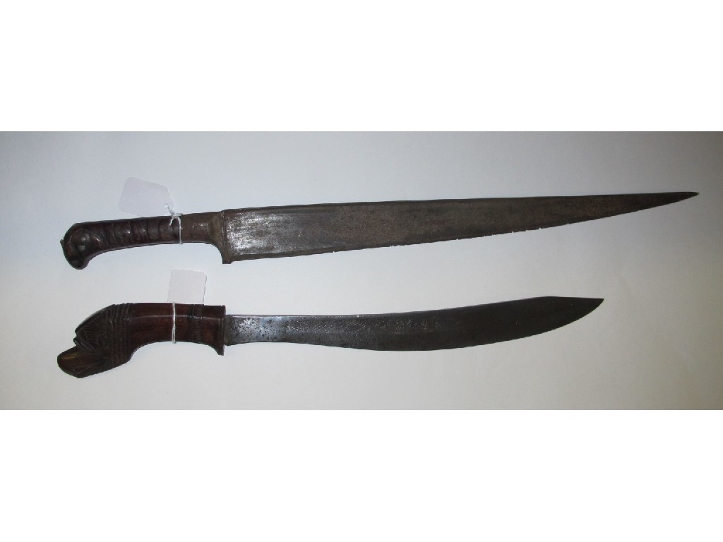 Appraisal: Lot comprising two Ethnic short swords