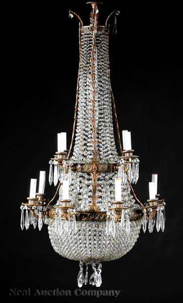 Appraisal: A Pair of Neoclassical-Style Bronze and Crystal Twelve-Light Chandeliers th