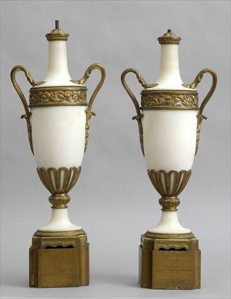 Appraisal: PAIR OF LOUIS XVI-STYLE GILT-METAL MOUNTED WHITE MARBLE URNS Each