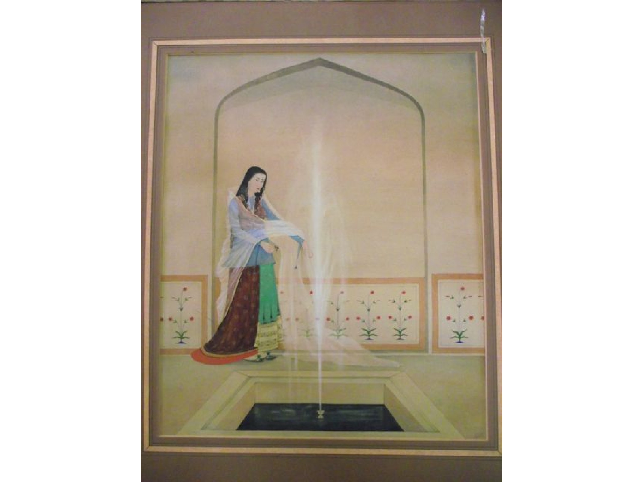 Appraisal: A gouache painting in the Moghul style of a young