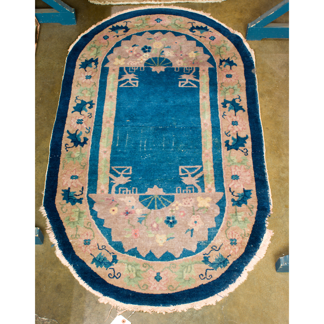 Appraisal: CHINESE OVAL BLUE BACKGROUND CARPET Chinese oval blue background carpet