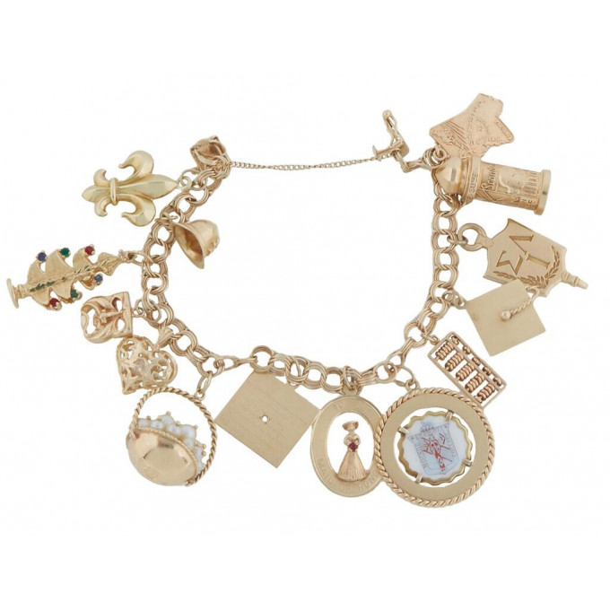 Appraisal: K Yellow Gold Triple Link Charm Bracelet with charms most