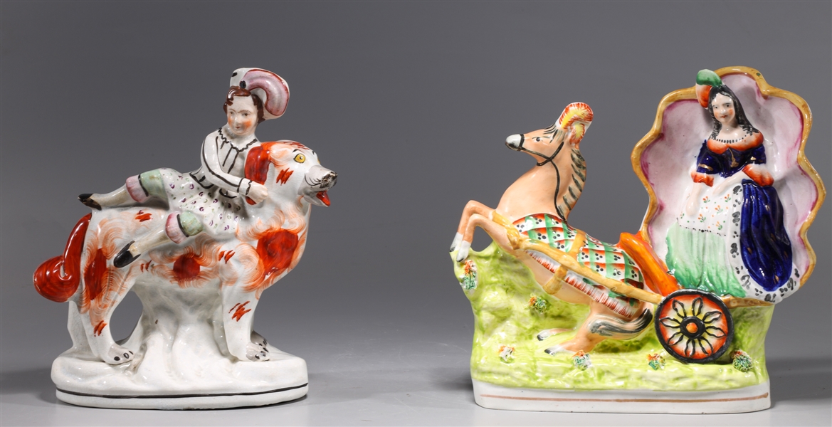 Appraisal: Two antique th century English Staffordshire porcelain figures of circus