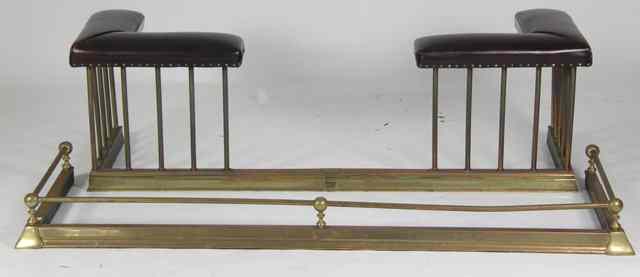 Appraisal: A club fender with brown leather seats and brass base