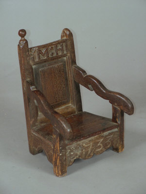 Appraisal: A provincial oak child's armchair th century and later the