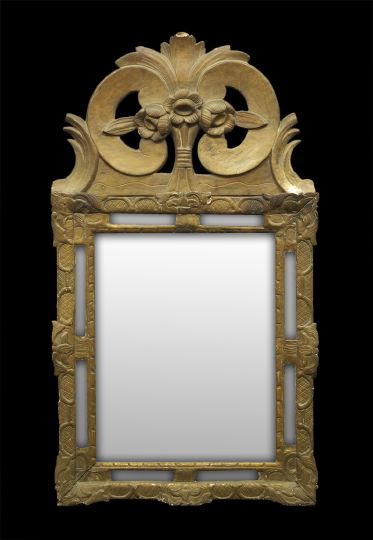 Appraisal: Italian Giltwood Looking Glass early th century the rectangular plate