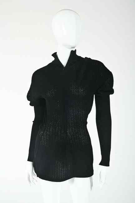 Appraisal: ALA A BLACK KNIT TUNIC s size medium