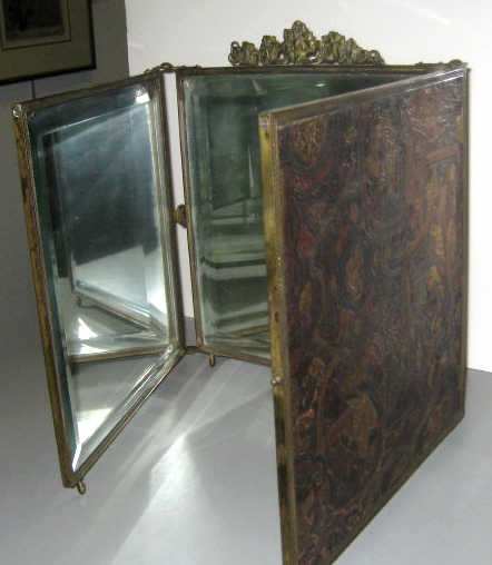 Appraisal: ENGLISH THREE-PART DRESSING MIRROR Beveled mirror panels mounted in brass