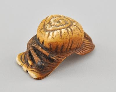 Appraisal: Namekuji Ivory Netsuke Depicting a Namekuji snail on a leaf