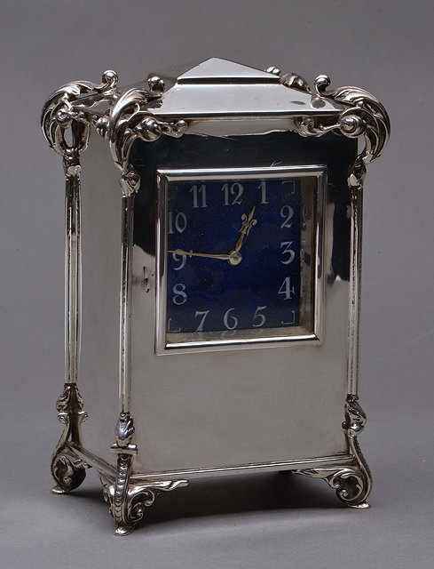 Appraisal: A SILVER TIMEPIECE with blue enamel dial and French movement