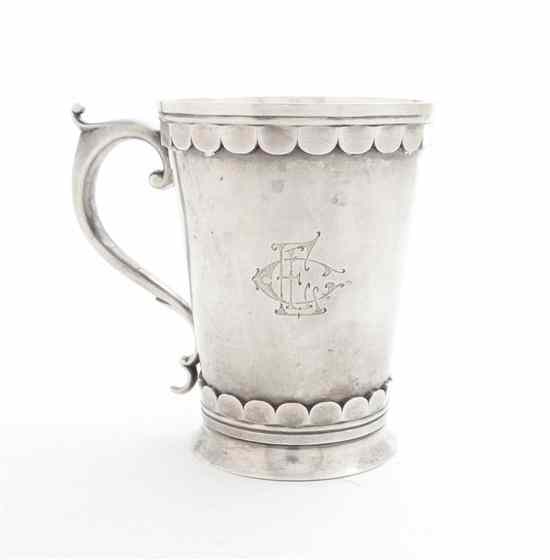 Appraisal: A Continental Silver Mug of circular tapering form having bands