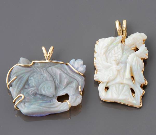 Appraisal: A collection of two carved opal and gold pendants