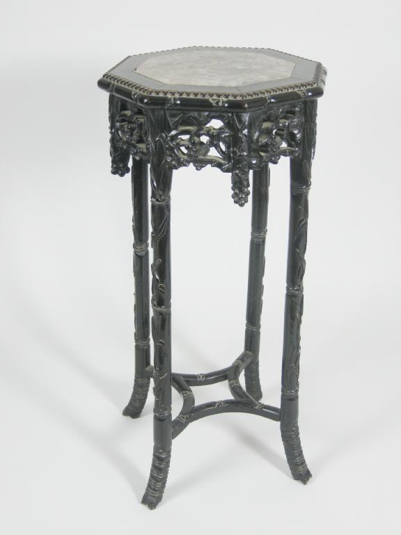 Appraisal: A Chinese hardwood octagonal Table with marble top