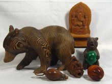 Appraisal: A collection of treen comprising a bear in pine with