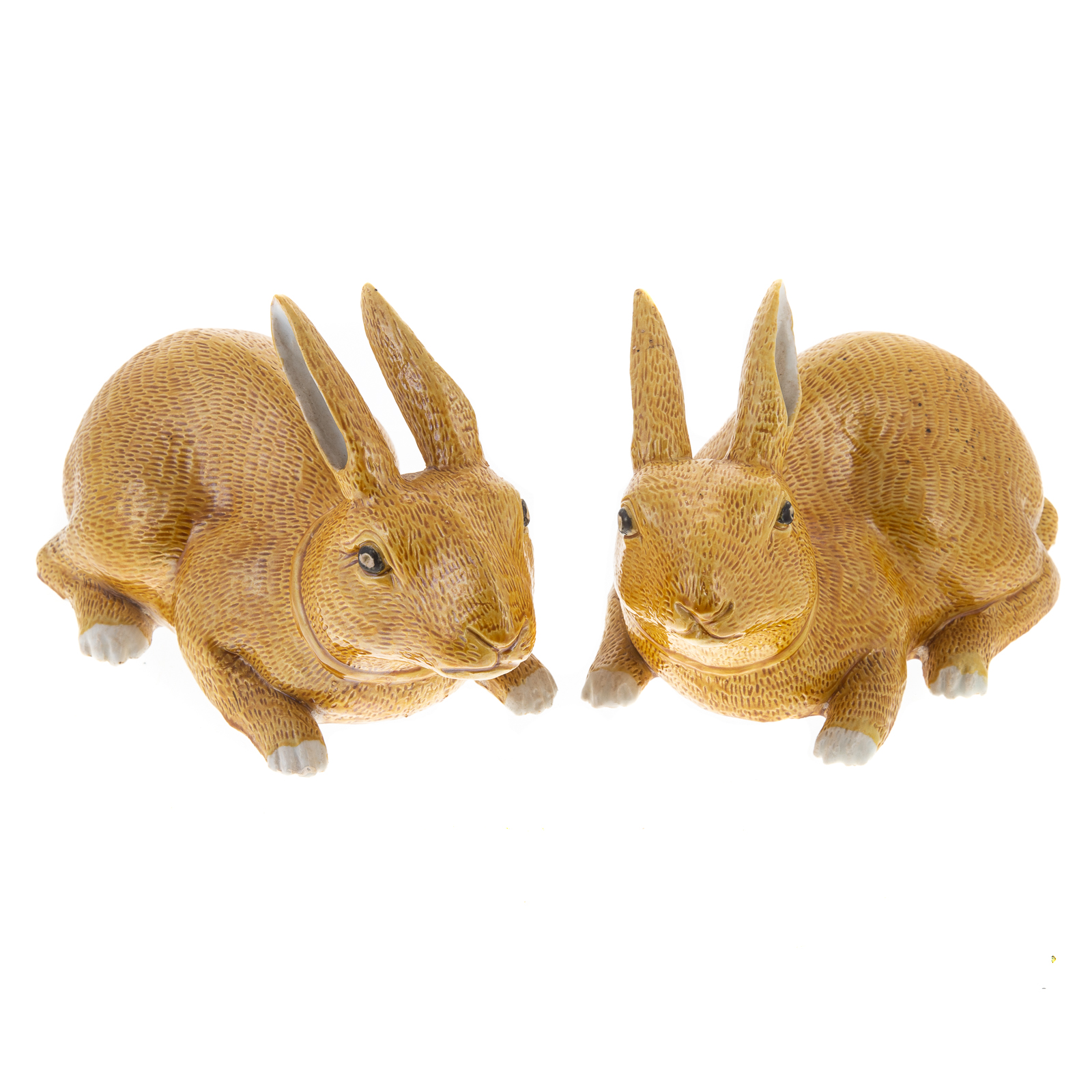 Appraisal: A PAIR OF CHINESE EXPORT OCHRE GLAZED RABBITS Having textured