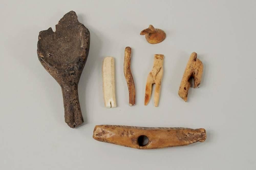 Appraisal: Group of Inuit Carved Fossilized Tools Group of Inuit carved