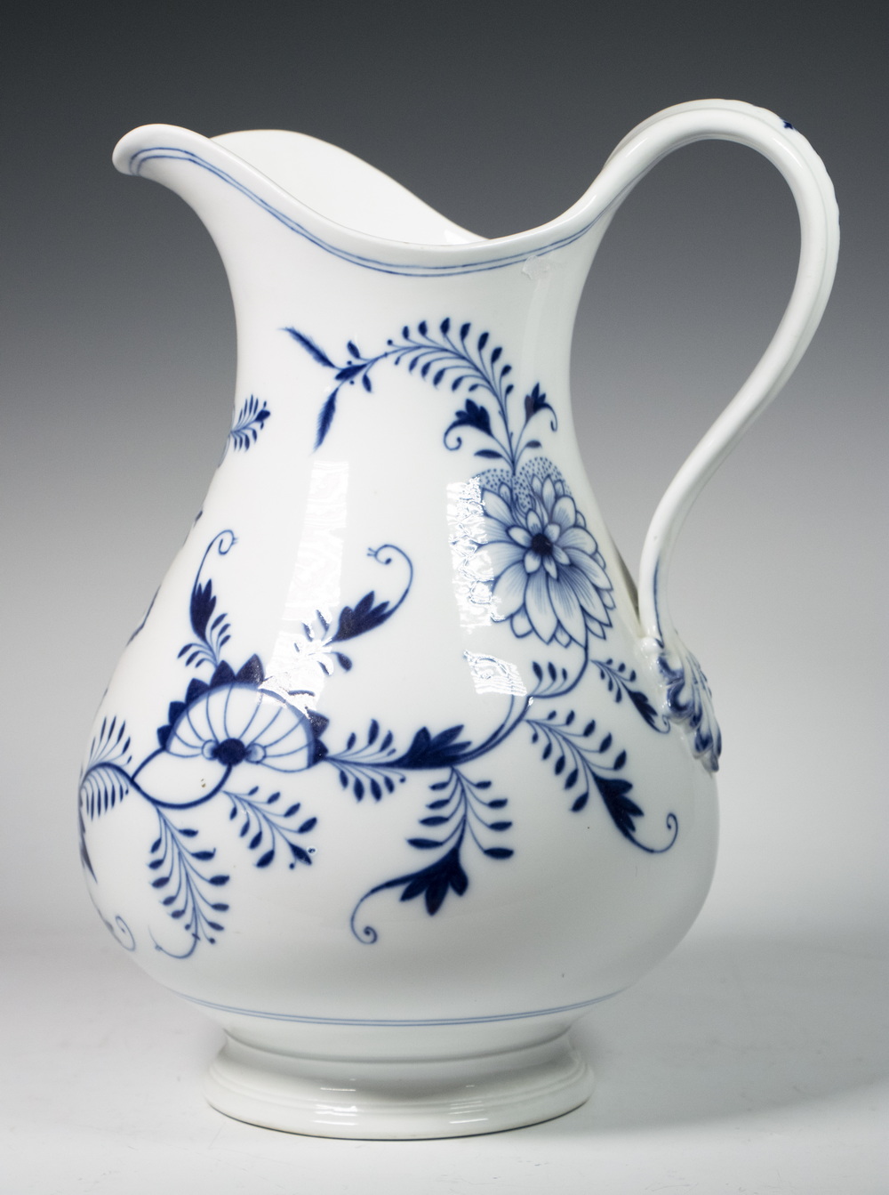 Appraisal: MEISSEN BLUE ONION PATTERN PORCELAIN PITCHER Blue White Decorated German