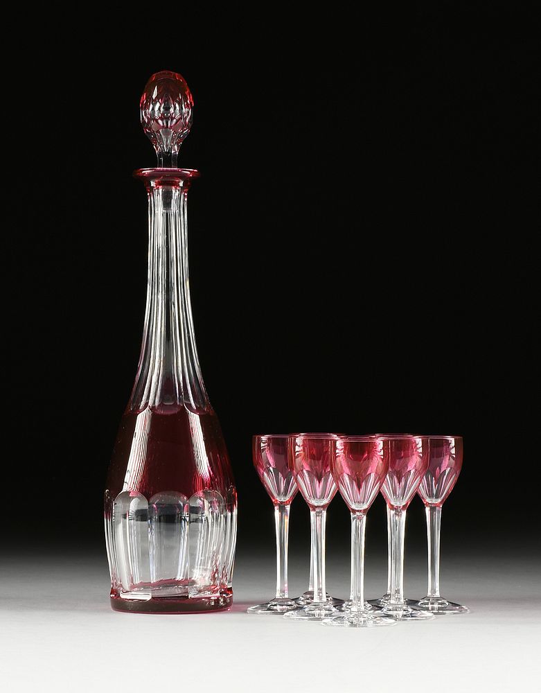 Appraisal: A NINE PIECE FRENCH CRANBERRY CUT TO CLEAR CRYSTAL LIQUEUR