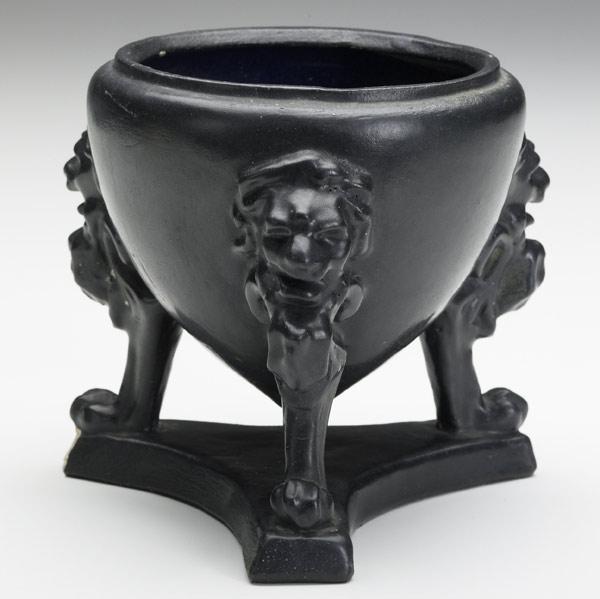 Appraisal: ZARK Small three-footed planter with gargoyles on a stand covered