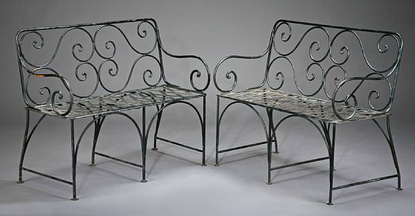 Appraisal: A pair of French painted iron garden settees and four